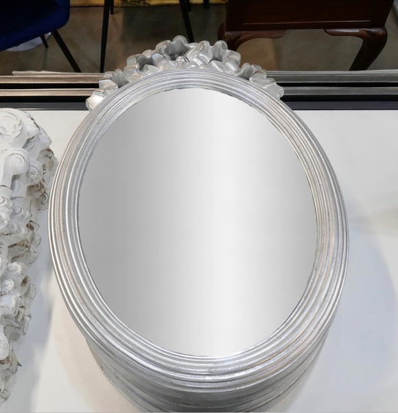 Silver decoration to top mirror
