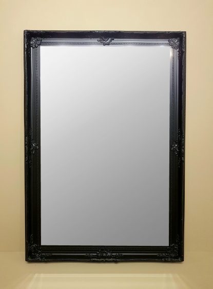 Black Mirror with ornate frame